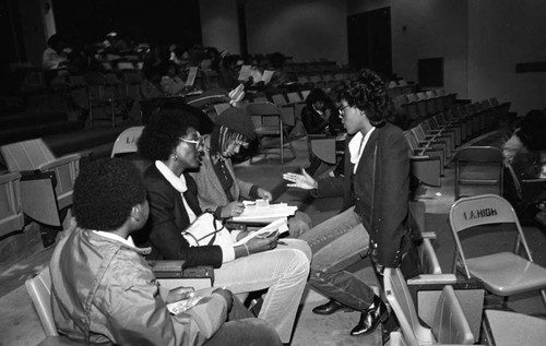 Advisors coaching students during a financial aid workshop, Los Angeles, 1983