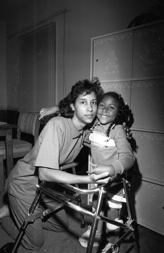 Ryda Collins, March of Dimes Poster Child, posing for a portrait, Los Angeles, 1989