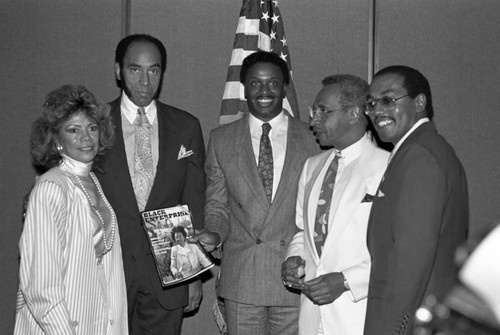Black Enterprise Magazine luncheon participants posing together, Los Angeles, 1987