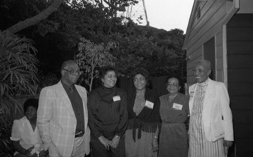 Guests posing during an event at the home of Dr. James Crayton, Los Angeles, 1983