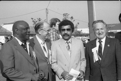 Kenneth Hahn and others gather at the opening of Martin Luther King, Jr. Shopping Center, Los Angeles, 1984