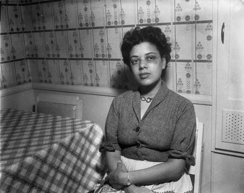 Woman at dining table, Los Angeles