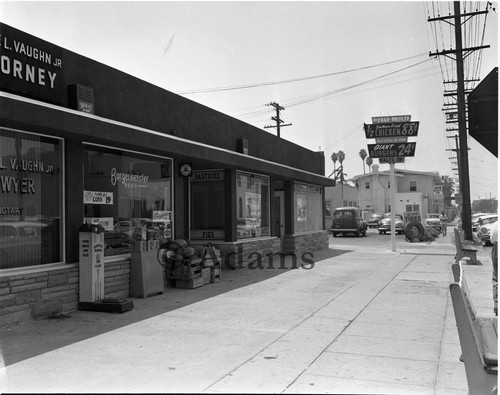 Stores along a strip mall, Los Angeles, 1956