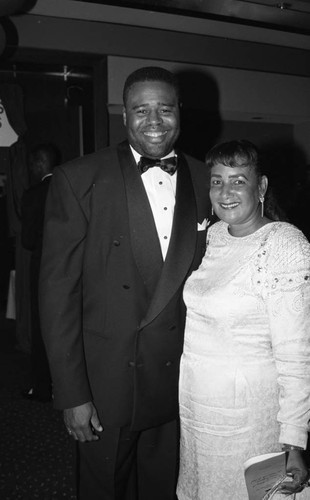 Chi McBride posing with Carolyn Bingham during the "A Midsummer's Night Magic" event, Beverly Hills, 1994