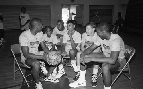 Byron Scott talking with Summerscope participants at Crenshaw High School, Los Angeles, 1986