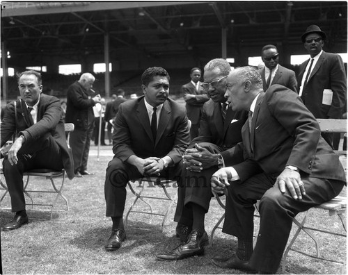 Mervyn Dymally, F. Douglas Ferrell and Gilbert Lindsay talking together during the Conference of the Unemployed, Los Angeles, 1964