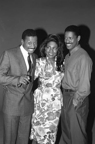 Robert Townsend, Sheryl Lee Ralph and Denzel Washington posing together, Los Angeles, 1989