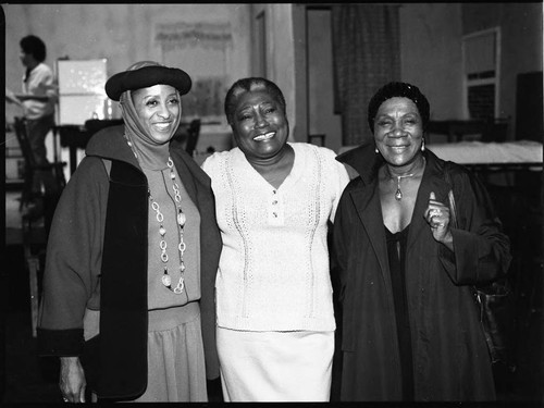 Marla Gibbs, Ester Rolle, and Beah Richards pose for a group portrait in a theater, Los Angeles, 1984