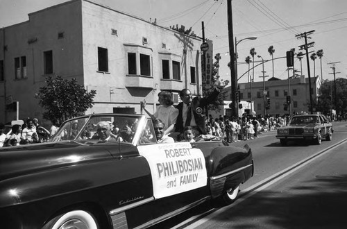 Robert Philibosian and his family riding in the 16th Annual Easter Parade, South Central Los Angeles, 1984