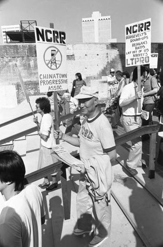 Men and woman marching during the Day of Remembrance, Los Angeles, 1982