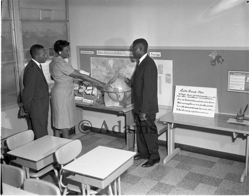 Men and woman in a classroom, Los Angeles, 1963