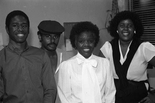 Two men and two women posing together for portrait, Los Angeles, 1983