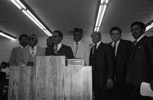 Church of God in Christ male members standing at the pulpit, Los Angeles, 1985