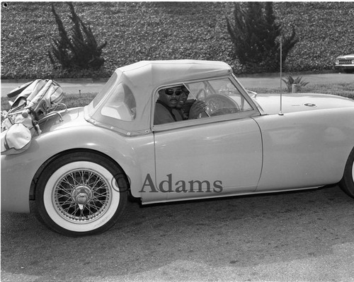 Two men in a car, Los Angeles, 1962