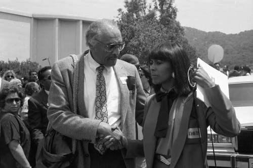 William Marshall and Sheila Frazier attending Sammy Davis Jr.'s funeral service, Glendale, California, 1990