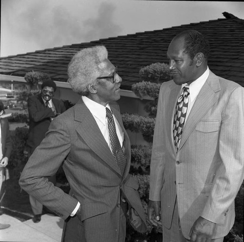 Bayard Rustin talking with Tom Bradley, Los Angeles, 1973