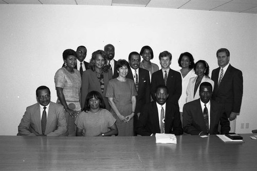 Business conference participants posing together, Los Angeles, 1994