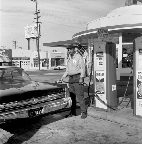 Service station attendant, Los Angeles, 1967