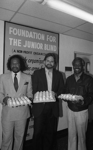 American Legion Jackie Robinson Post 252 members donating eggs for Easter, 1984