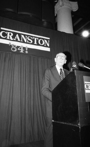 Senator Alan Cranston speaking from a lectern, Los Angeles, 1983