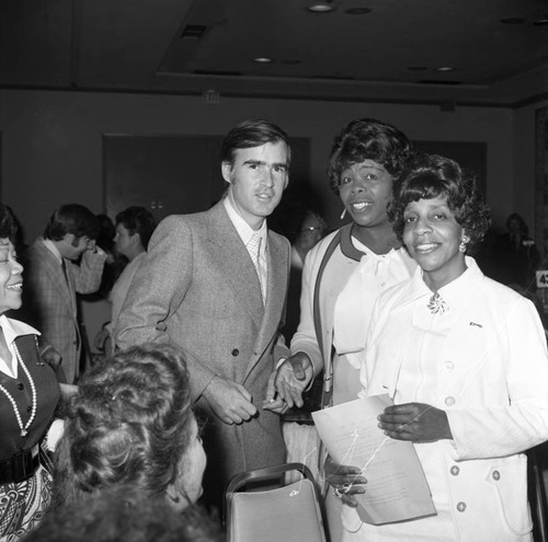 Jerry Brown posing with others at a special event, Los Angeles, 1973