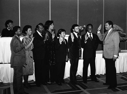 Crenshaw Chamber of Commerce members during a swearing-in ceremony, Los Angeles, 1989