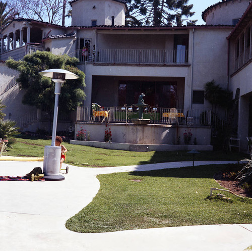 Berry Gordy's house party guests in the backyard, Los Angeles