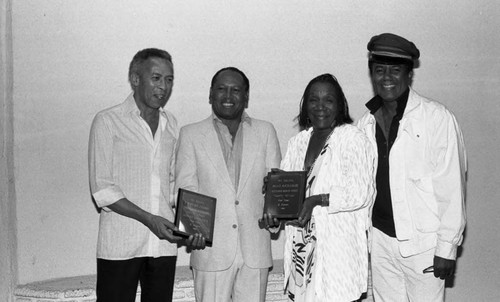 Beach Richards posing with Freddie Jett and others at the Pied Piper Club, Los Angeles, 1986