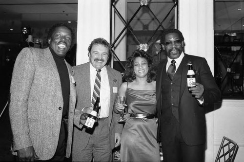 Beverly Hilton event guests Dick Butkus and Bubba Smith posing together, Los Angeles, 1983