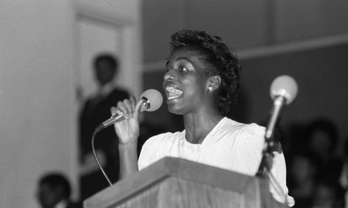 Woman singing or speaking during the NAACP 75th anniversary kick-off celebration at the First AME, Los Angeles, 1984