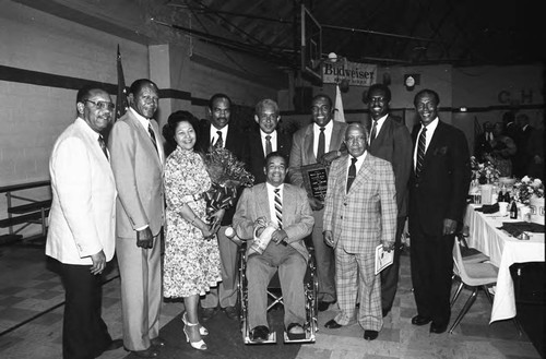 Attendees of the Black Athletes Hall of Fame dedication posing together, Los Angeles, 1984