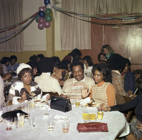 Patricia Crowder posing with others at a Super Bowl party, Los Angeles, 1977