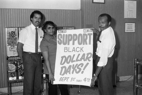 Black Dollar Days staff helping to promote the event, Los Angeles, 1983