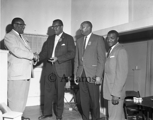 Shaking hands, Los Angeles, 1962