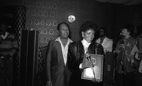 Melba Moore receiving an award at the Pied Piper, Los Angeles, ca. 1980