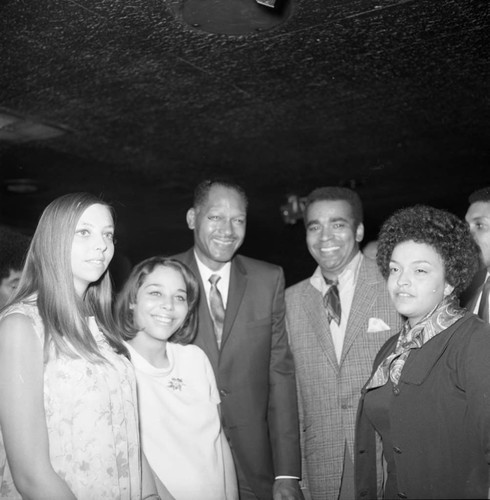 Tom Bradley and Greg Morris pose together at a mayoral campaign event,, Los Angeles, 1969