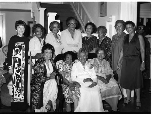 Mrs. Casmen poses with others for a group portrait, Los Angeles, 1983