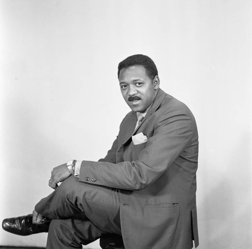 Guy Crowder posing in the studio for self-portrait, Los Angeles