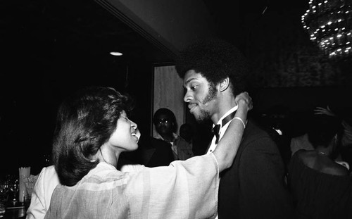 Lawrence Hilton-Jacobs talking with a woman at the NAACP Image Awards, Los Angeles, 1978