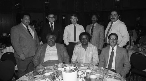 Miller Brewing Company representatives posing together at a Fathers Day luncheon, Los Angeles, 1984