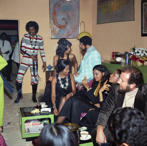 Gwen Gordy Fuqua talking with Suzanne de Passe at a party, Los Angeles