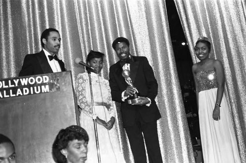 Larry Carroll and Danielle Spencer presenting an award during the NAACP Image Awards, Los Angeles, 1981