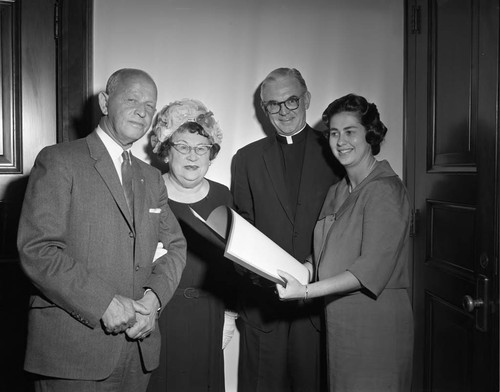 Councilwoman with resolution, Los Angeles, 1963