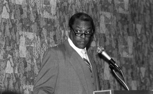 Man speaking at the Urban League Career Expo, Los Angeles, 1984