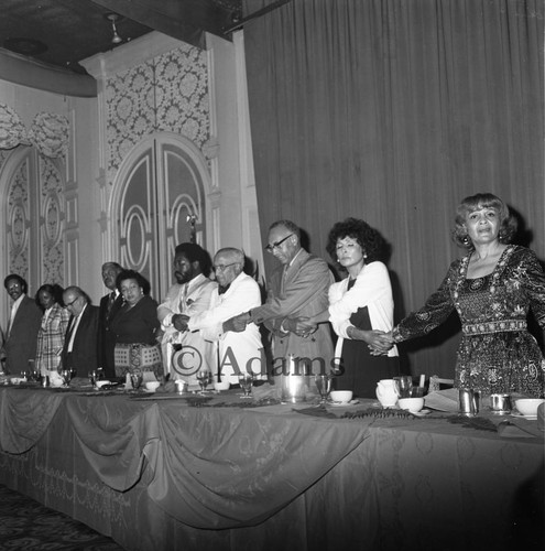 Holding hands at Brookins tribute, Los Angeles, 1972