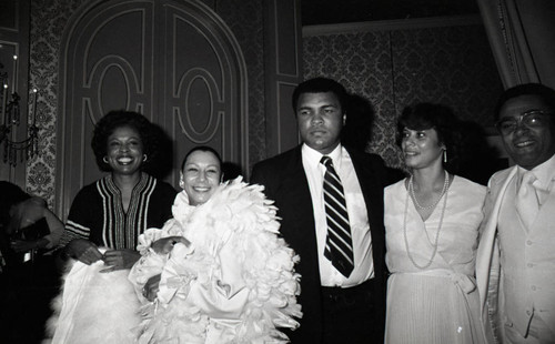 Muhammad Ali posing with Diane Watson and others, Los Angeles, 1982