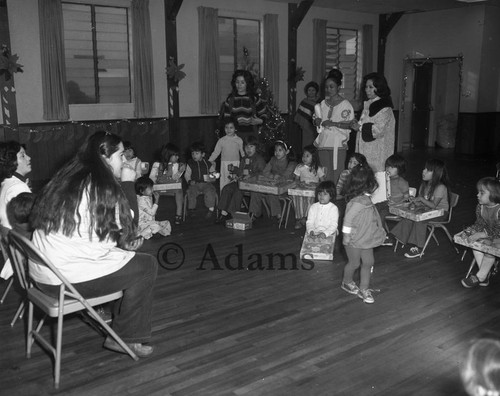 Adults and Children with Presents, Los Angeles, ca. 1965