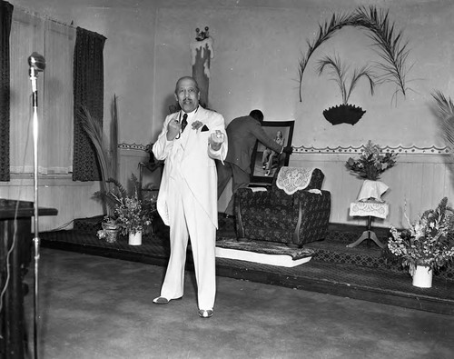 Bishop Charles Manuel "Sweet Daddy" Grace delivering a sermon, Los Angeles, ca. 1950