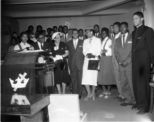 Men and women at pulpit, Los Angeles, 1957