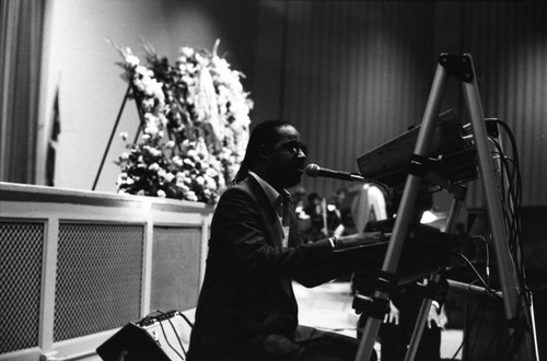 Stevie Wonder singing a tribute during Marvin Gaye's funeral service, Los Angeles, 1984